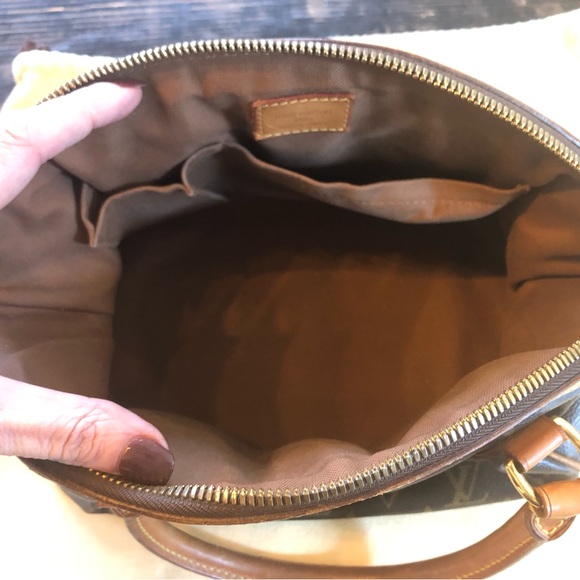 COPY - ๐ฏ Authentic Louis Vuitton Tivoli PM handbag. AUTHENTICATED - Picture 4 of 17